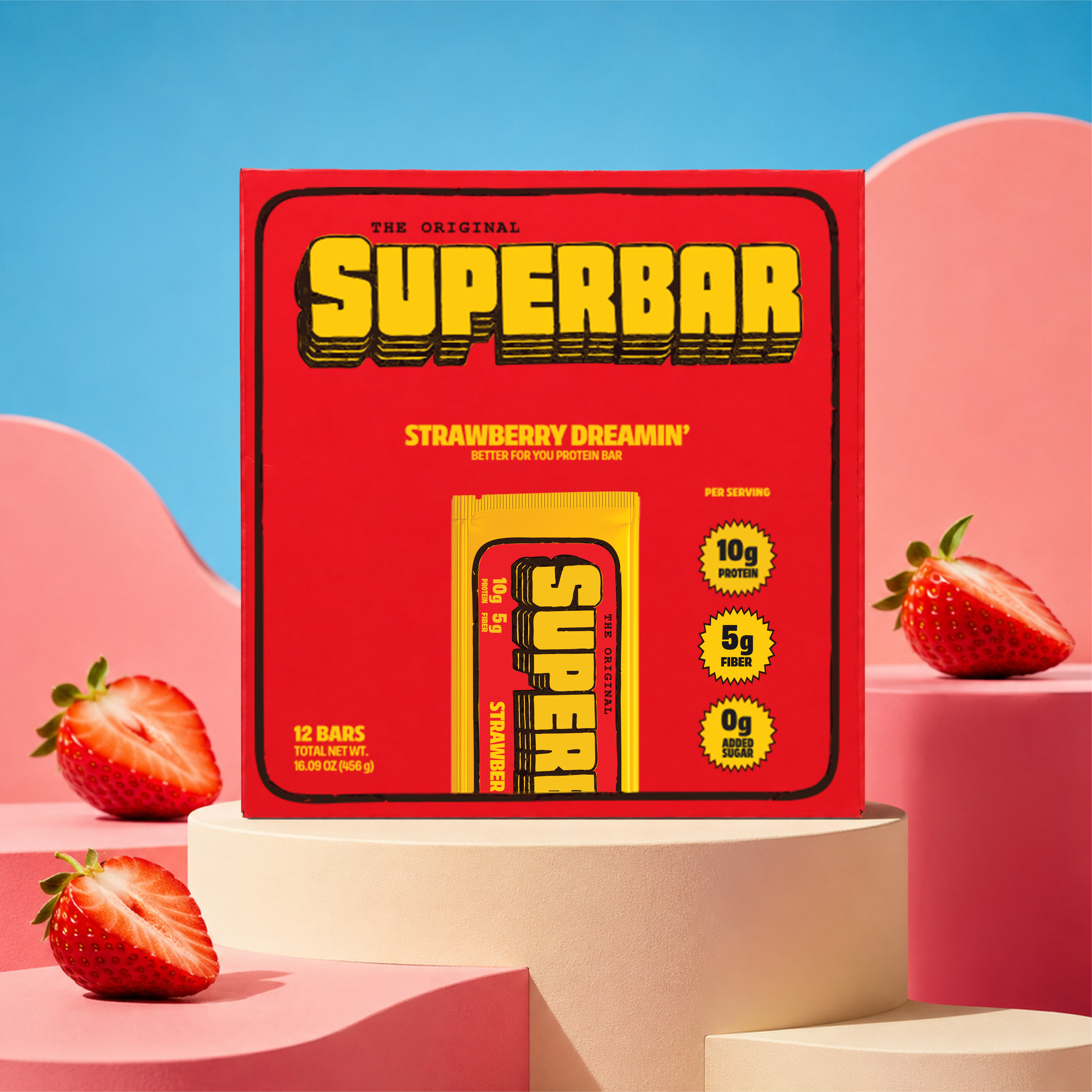 Strawberry Dreamin' Superbar on a pedestal with strawberries